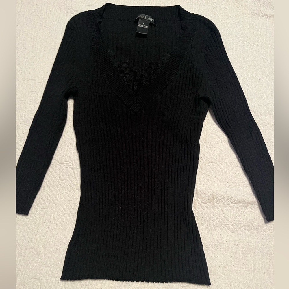 Stretchy black fitted long sleeved shirt